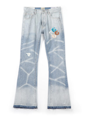 GALLERY DEPT. Denim patchwork, all-over print, distressed flared jeans with ripped details and a washed-out look.