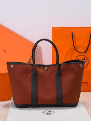 Hermès canvas version, saddle red.